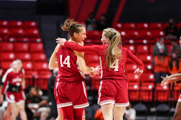 Ali Patberg and Nicole Cardaño-Hillary celebrate after a play.